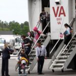 White South African refugees arrive at Dulles Airport in Virginia
