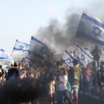 People block Israel’s main highway connecting Jerusalem and Tel Aviv
