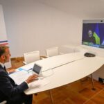 French President Emmanuel Macron attends a video conference with members