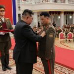 North Korean leader Kim Jong attends a national commendation ceremony