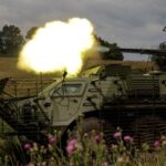 Ukrainian servicemen attend military drills at a training ground in