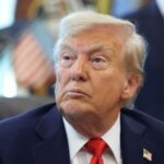 U.S. President Donald Trump signs executive orders in the Oval