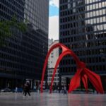 Unease grows in Chicago as Trump threatens to make the