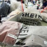 FILE PHOTO: Packs of clothing are pictured at a garment
