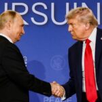 FILE PHOTO: U.S. President Trump meets with Russian President Putin