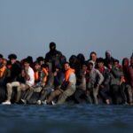 FILE PHOTO: Migrants attempt to cross the English channel from