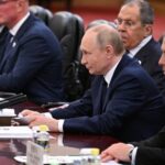 Russian President Vladimir Putin meets with Chinese President Xi Jinping
