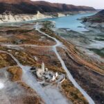 Aerial view of Kouris reservoir, where a once-submerged Church is
