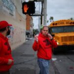 Immigrant rights advocacy volunteers patrol streets for ICE activity in