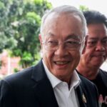 Pheu Thai party’s prime ministerial candidate Chaikasem Nitisiri arrives at
