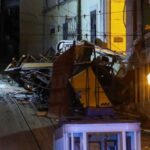 First responders work at the site of a funicular accident