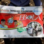 FILE PHOTO: Congolese volunteer Ferdinand Tangenyi displays a flip book