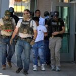FILE PHOTO: FILE PHOTO: Law enforcement officers, including HSI and