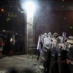 Anti-government protestors clash with riot police in Novi Sad