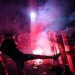 Anti-government protestors clash with riot police in Novi Sad