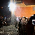 Anti-government protestors clash with riot police in Novi Sad