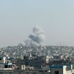 Smoke rises following an Israeli strike in Khan Younis