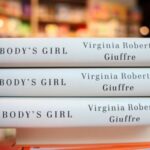 Copies of “Nobody’s Girl: A Memoir of Surviving Abuse and