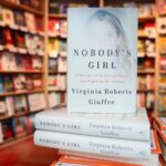 Copies of “Nobody’s Girl: A Memoir of Surviving Abuse and