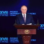 Russian President Putin attends a conference of the Russian Geographical