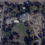 A satellite view shows the East Wing of the White