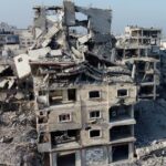 A drone view shows the destruction in a residential neighborhood,