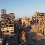 A drone view shows the destruction in a residential neighborhood,