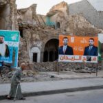 Campaign posters ahead of Iraqi parliamentary election, in Mosul