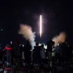 Long March 2F rocket carrying the Shenzhou-21 spacecraft blasts off from launchpad