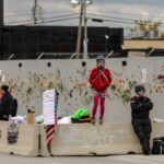 Protesters gather outside the Broadview ICE facility, in Chicago