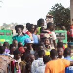 People gather at a petrol station in Bamako, Mali