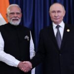Russian President Putin and Indian Prime Minister Modi meet at