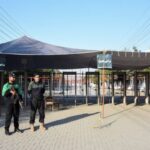 Police officers stand guard ahead of the match between Pakistan