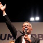 New Turkish Cypriot leader Erhurman celebrates winning the Turkish Cypriot
