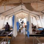 FILE PHOTO: Injured displaced Sudanese fleeing violence in al-Fashir and