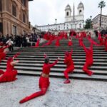 FILE PHOTO: Dancers perform on the Spanish Steps to raise