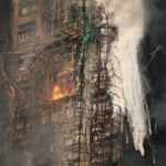 Flames engulf bamboo scaffolding across multiple buildings at Wang Fuk