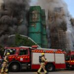 Flames engulf bamboo scaffolding across multiple buildings at Wang Fuk