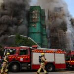 Flames engulf bamboo scaffolding across multiple buildings at Wang Fuk
