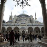 People visit Ottoman-era Sultanahmet Mosque, known as the Blue Mosque,