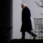 FILE PHOTO: U.S. President Donald Trump walks out of the