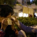 Michelle Liu helps Cheung Yuk-ling, who survived the deadly fire