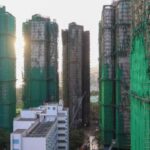 Charred remains of multiple residential towers at Wang Fuk Court