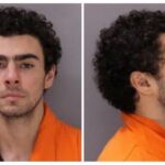 Luigi Mangione poses for a booking photograph in Altoona