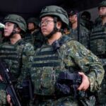 Taiwan reservists operate a Taiwan made Hummer 2 Drone during