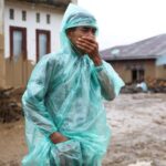 Aftermath at an area hit by flash floods in Palembayan,