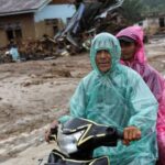 Aftermath at an area hit by flash floods in Palembayan,