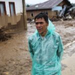 Aftermath at an area hit by flash floods in Palembayan,