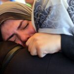 People mourn freelance Palestinian journalist Mahmoud Wadi, at Nasser hospital