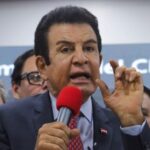 Presidential candidate Salvador Nasralla of Honduras’ Liberal Party (PLH) holds